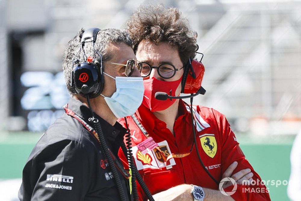 Guenther Steiner, Team Principal, Haas F1, and Mattia Binotto, Team Principal Ferrari, on the grid