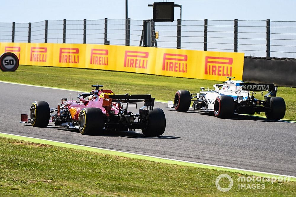 Sebastian Vettel, Ferrari SF1000, passes Nicholas Latifi, Williams FW43