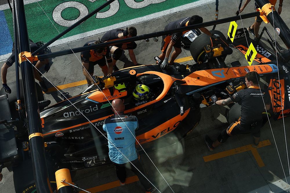 Lando Norris, McLaren MCL36, in the pits during practice