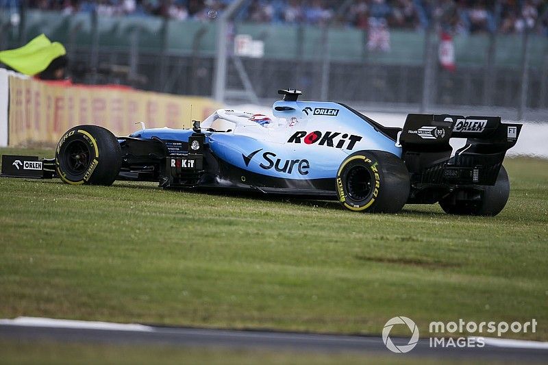 George Russell, Williams Racing FW42, on the grass