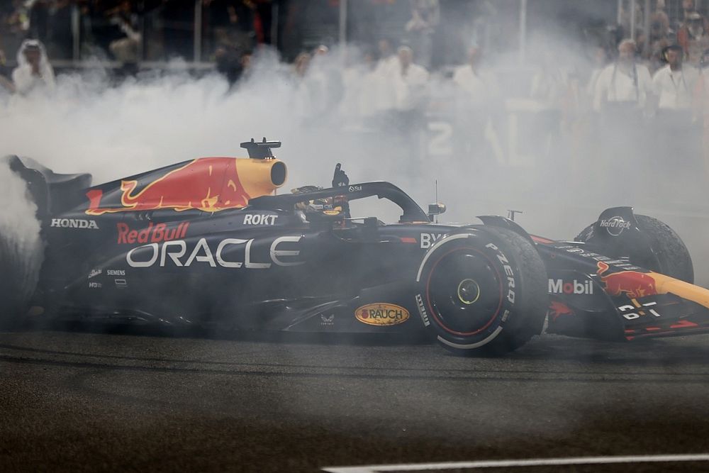 Max Verstappen, Red Bull Racing RB19, 1st position, performs donuts at the end of the race