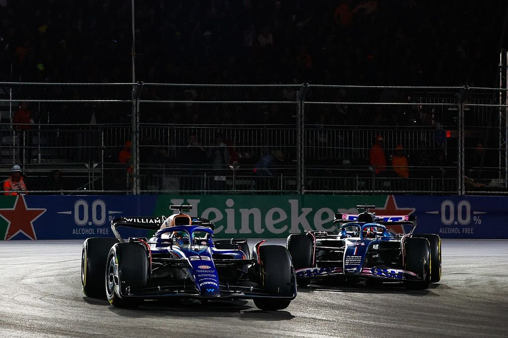 Alex Albon, Williams FW45, leads Esteban Ocon, Alpine A523