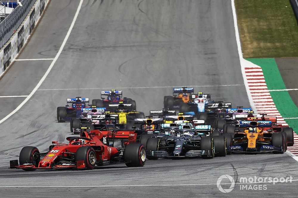 Charles Leclerc, Ferrari SF90, leads Valtteri Bottas, Mercedes AMG W10, Lewis Hamilton, Mercedes AMG F1 W10, Lando Norris, McLaren MCL34, Kimi Raikkonen, Alfa Romeo Racing C38, and the rest of the field at the start