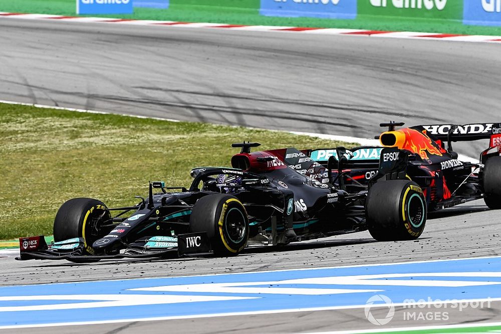 Lewis Hamilton, Mercedes W12 and Max Verstappen, Red Bull Racing RB16B battle