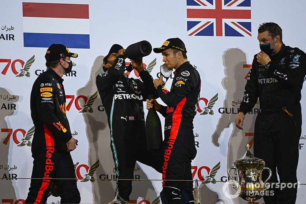 Max Verstappen, Red Bull Racing, 2nd position, Lewis Hamilton, Mercedes-AMG F1, 1st position, and Alex Albon, Red Bull Racing, 3rd position, on the podium