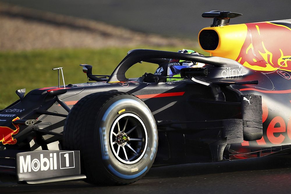 Видео: Перес дебютировал за рулем Red Bull