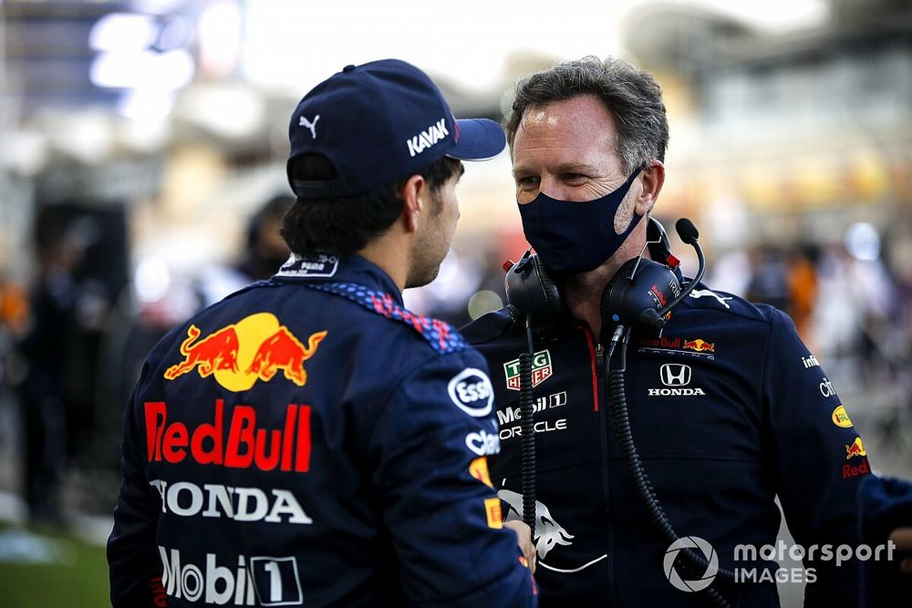 Christian Horner, Team Principal, Red Bull Racing and Sergio Perez, Red Bull Racing on the grid