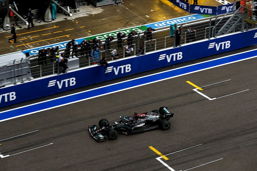 Race Winner Lewis Hamilton, Mercedes W12 crosses the finish line