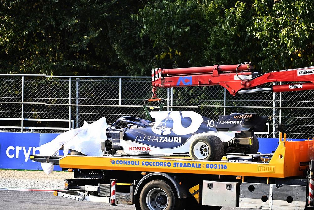 The car of Pierre Gasly, AlphaTauri AT02, is returned to the pits on a truck