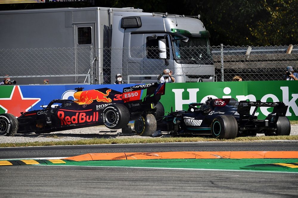 Max Verstappen, Red Bull Racing RB16B, and Lewis Hamilton, Mercedes W12, crash out