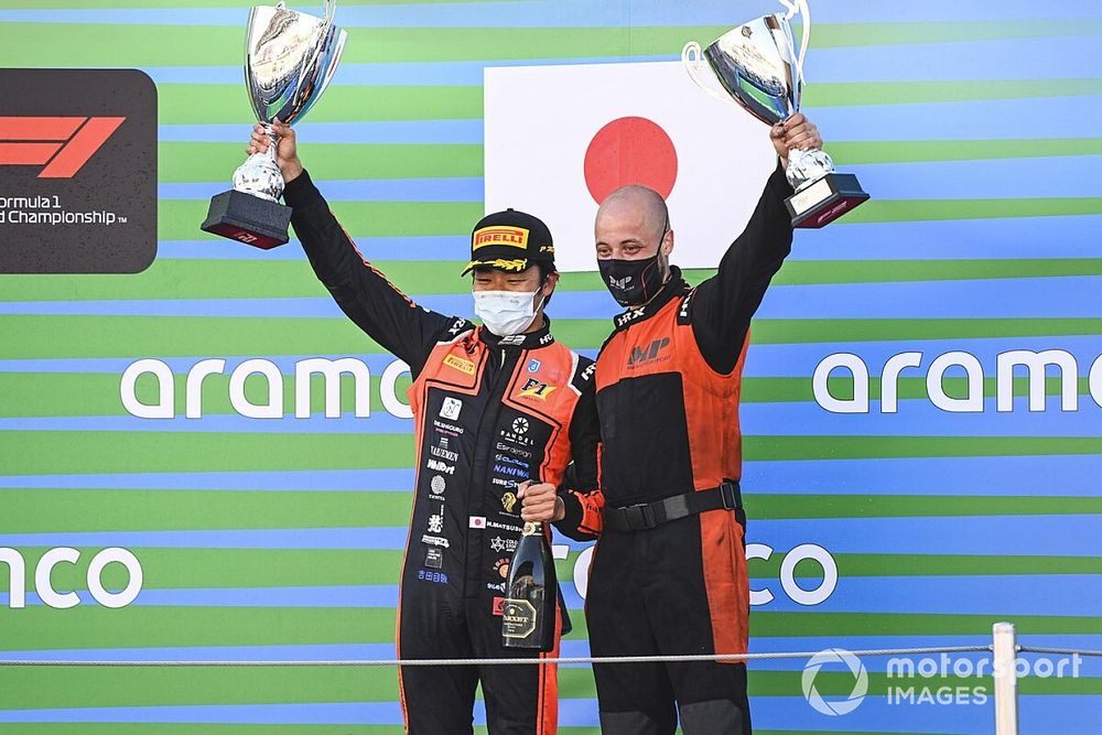 Nobuharu Matsushita, MP Motorsport, 1st position, celebrates on the podium with his team mate