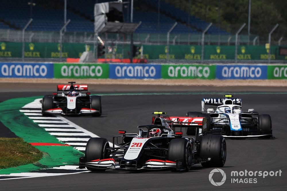 Kevin Magnussen, Haas VF-20, Nicholas Latifi, Williams FW43, and Romain Grosjean, Haas VF-20