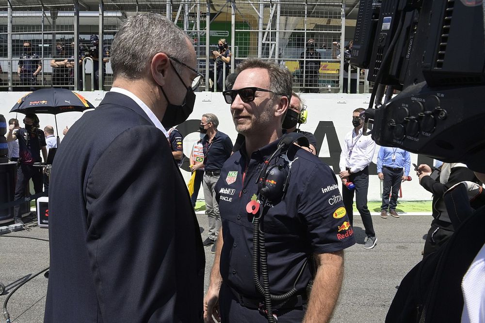 Stefano Domenicali, CEO, Formula 1, and Christian Horner, Team Principal, Red Bull Racing, talk on the grid