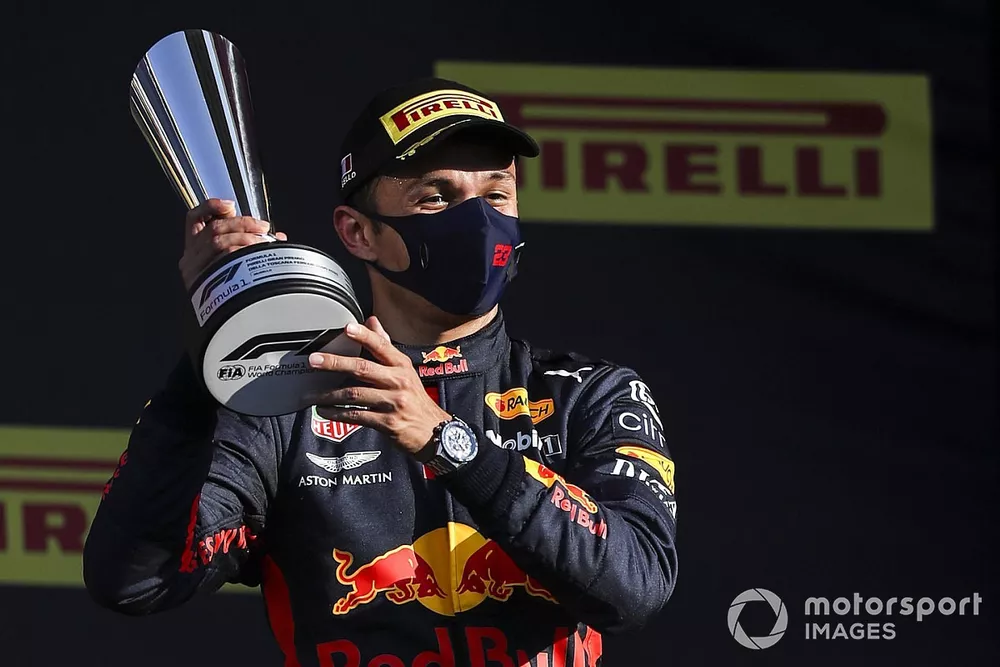 Alex Albon, Red Bull Racing, 3rd position, on the podium with his trophy