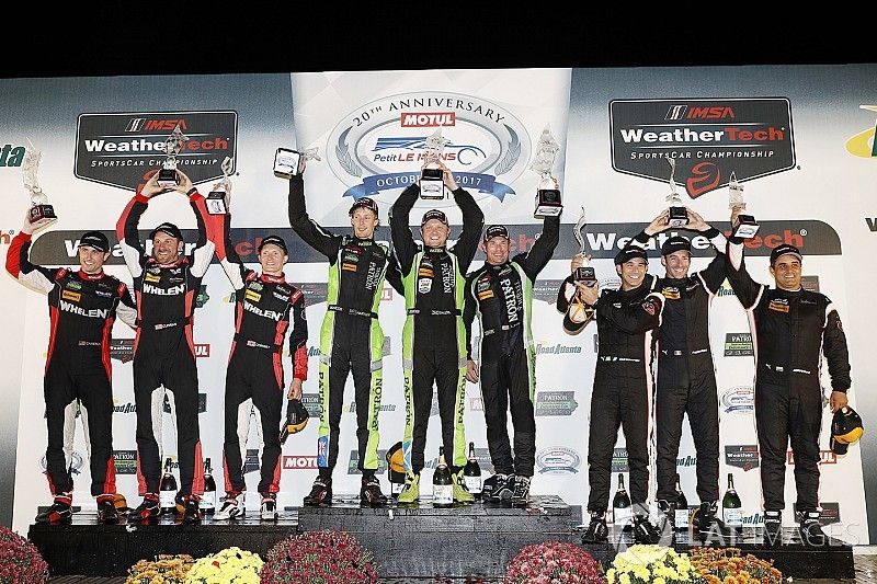 P podium: winners Scott Sharp, Ryan Dalziel, Brendon Hartley, Tequila Patrón ESM, second place Eric Curran, Dane Cameron, Mike Conway, Action Express Racing, third place Helio Castroneves, Simon Pagenaud, Juan Pablo Montoya, Team Penske