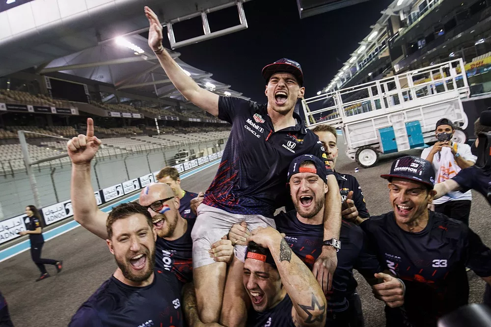 Max Verstappen, Red Bull Racing, celebrate with team members