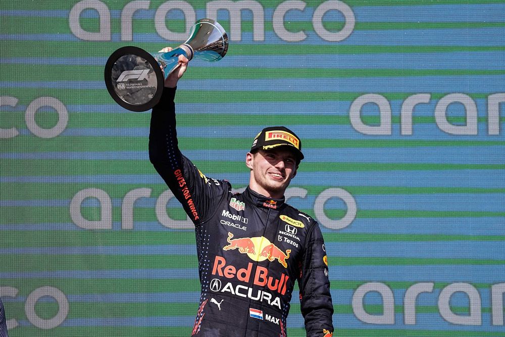 Max Verstappen, Red Bull Racing, 1st position, lifts his trophy