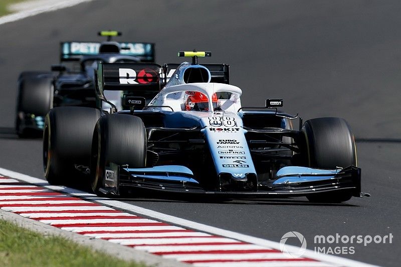 Robert Kubica, Williams FW42, leads Valtteri Bottas, Mercedes AMG W10