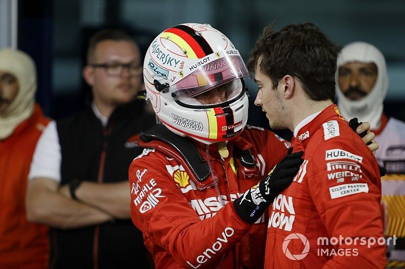 Sebastian Vettel, Ferrari, avec son coéquipier Charles Leclerc après la course