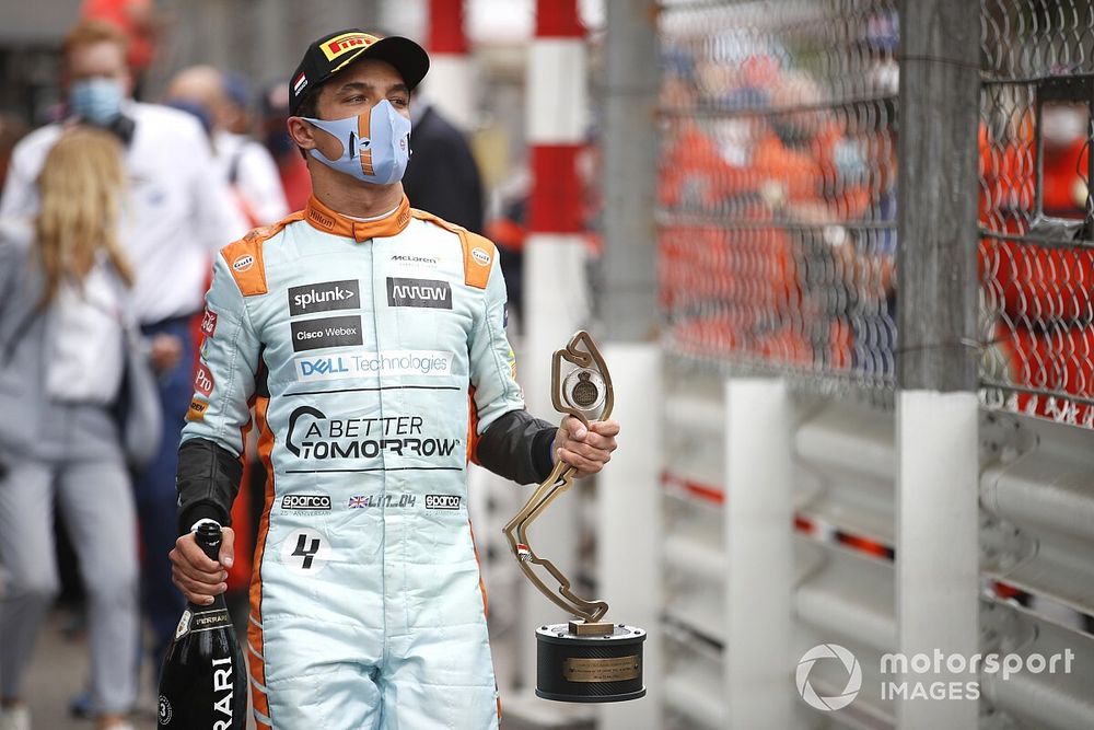 Lando Norris, McLaren, 3rd position, with his trophy and Champagne