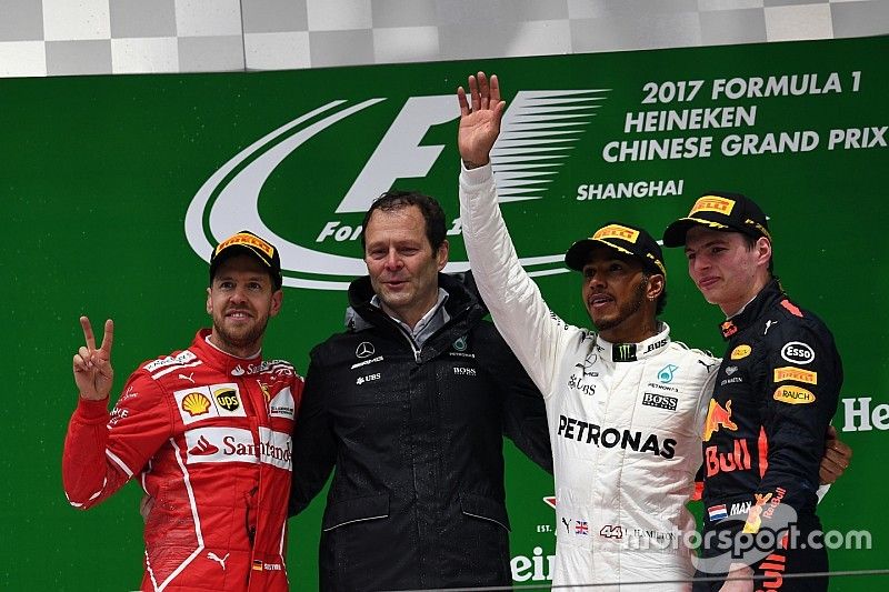 Podium: second place Sebastian Vettel, Ferrari, Aldo Costa, Mercedes AMG F1 Engineering Director, Race winner Lewis Hamilton, Mercedes AMG F1, third place Max Verstappen, Red Bull Racing