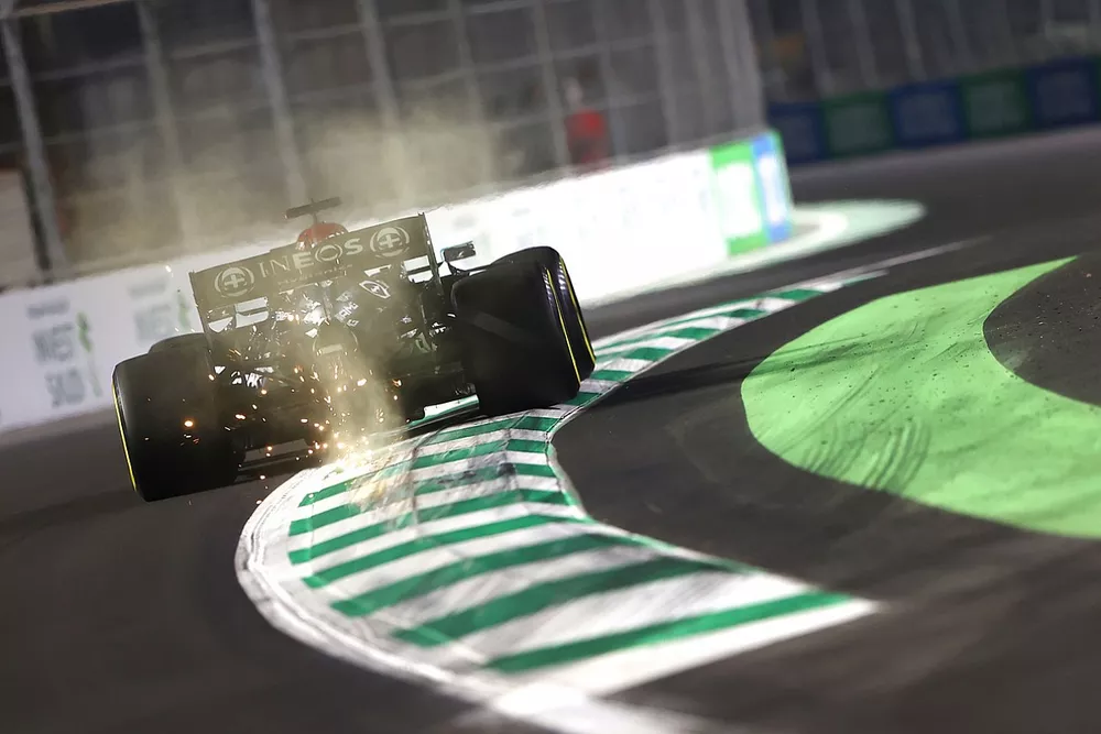 Sparks kick up from Lewis Hamilton, Mercedes W12