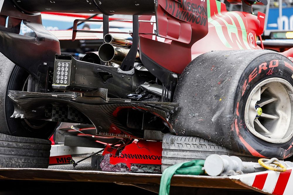 The damaged car of Charles Leclerc, Ferrari SF21, on a truck