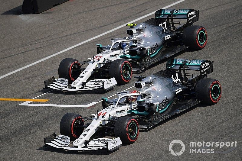 Pole man Lewis Hamilton, Mercedes AMG F1 W10, and Valtteri Bottas, Mercedes AMG W10, arrive on the grid