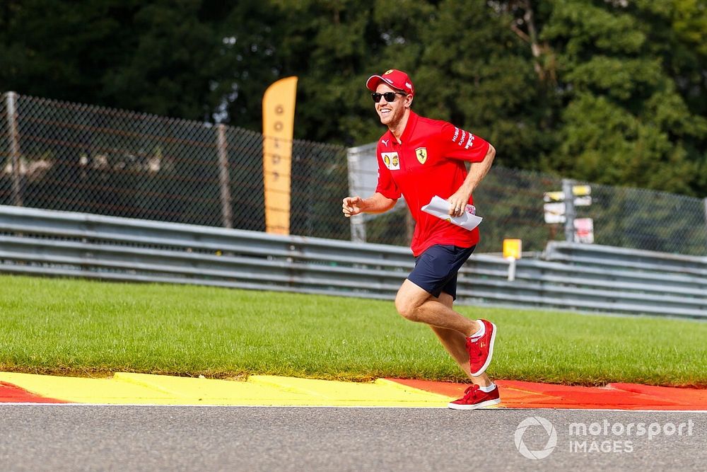 Sebastian Vettel, Ferrari, runs up Eau Rouge