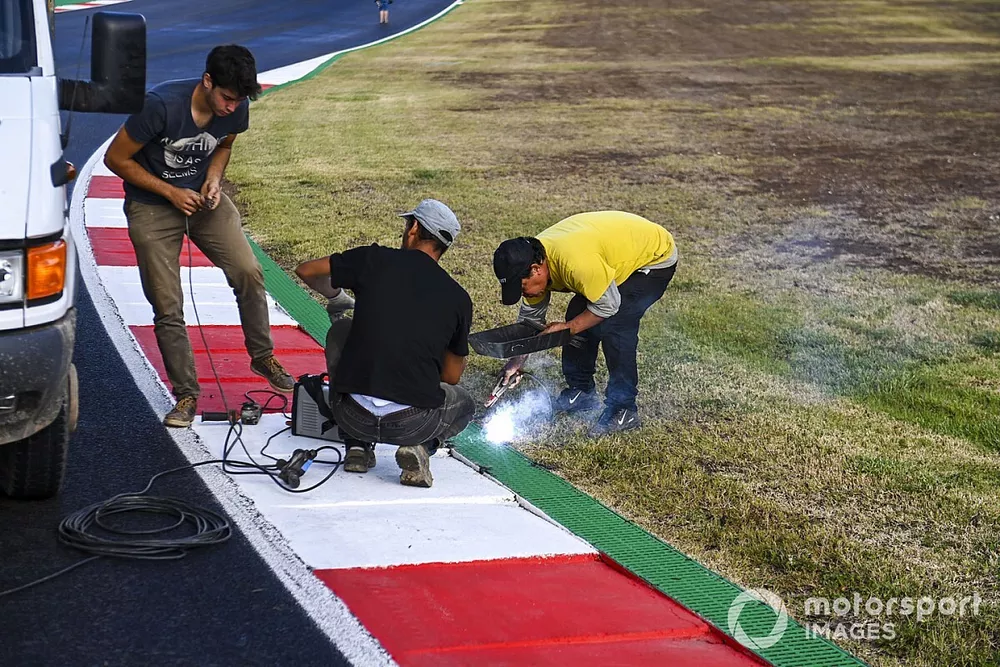 Workers working on the track