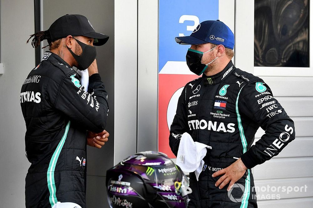 Pole man Lewis Hamilton, Mercedes-AMG F1, and Valtteri Bottas, Mercedes-AMG F1, talk in Parc Ferme