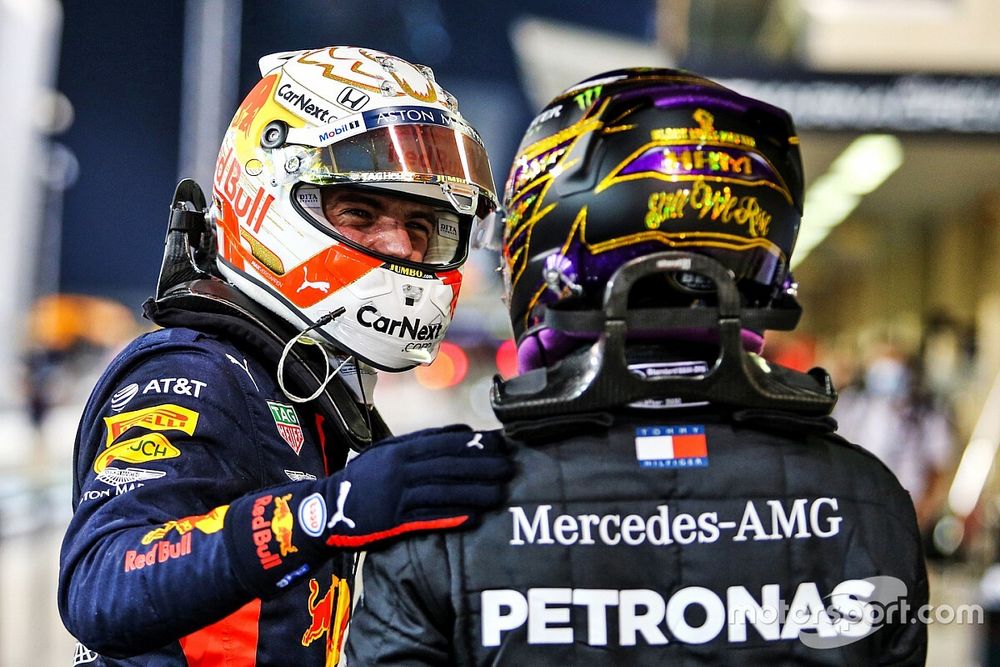 Lewis Hamilton, Mercedes-AMG F1, congratulates Max Verstappen, Red Bull Racing, on securing pole