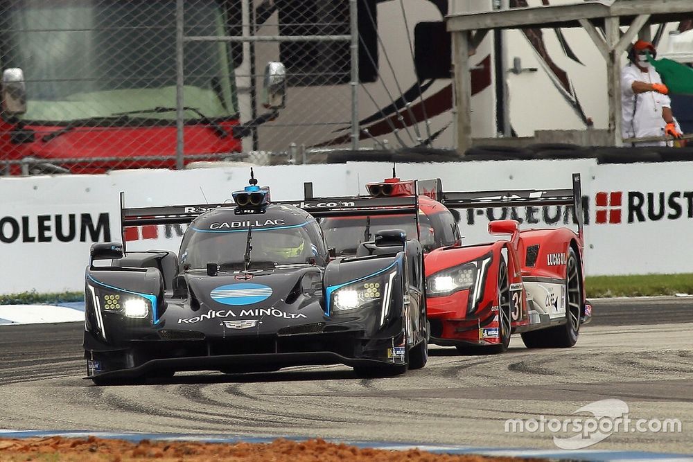 #10 Konica Minolta Cadillac DPi-V.R. Cadillac DPi, DPi: Renger Van Der Zande, Ryan Briscoe, Scott Dixon