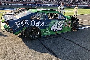 Kyle Larson rides the wall in mangled car, salvaging title hopes