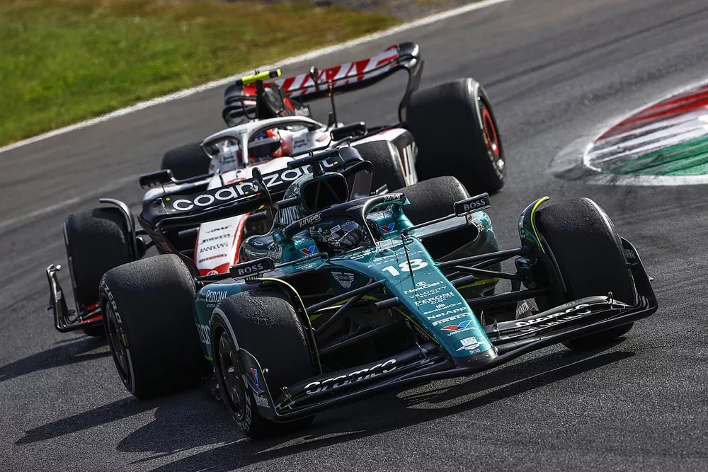 Lance Stroll, Aston Martin AMR23, Nico Hulkenberg, Haas VF-23