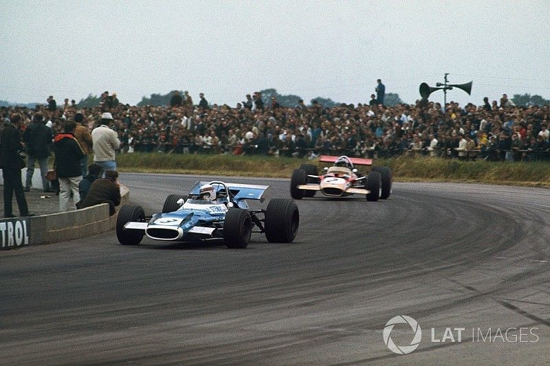 Jackie Stewart, Matra MS80 Ford, leads Jochen Rindt, Lotus 49B Ford