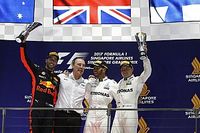 Hamilton gana en un caos en Singapur y es líder del mundial