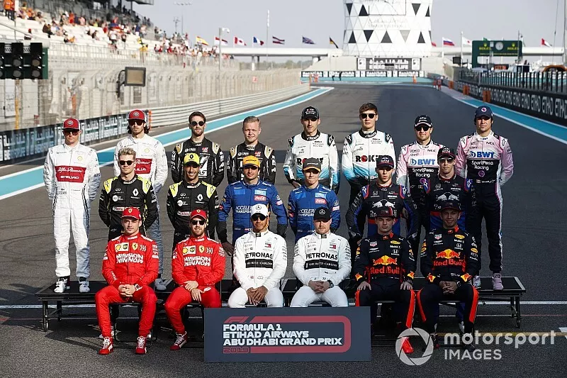 The class of 2019 pose for a final group photo. Back row L-R: Kimi Raikkonen, Alfa Romeo Racing, Antonio Giovinazzi, Alfa Romeo Racing, Romain Grosjean, Haas F1, Kevin Magnussen, Haas F1, Robert Kubica, Williams Racing, George Russell, Williams Racing, Sergio Perez, Racing Point, Lance Stroll, Racing Point. Middle row, L-R: Nico Hulkenberg, Renault F1 Team, Daniel Ricciardo, Renault F1 Team, Carlos Sainz Jr., McLaren MCL34, Lando Norris, McLaren, Pierre Gasly, Toro Rosso, and Daniil Kvyat, Toro Rosso. Middle row, L-R: Charles Leclerc, Ferrari, Sebastian Vettel, Ferrari, Lewis Hamilton, Mercedes AMG F1, Valtteri Bottas, Mercedes AMG F1, Max Verstappen, Red Bull Racing and Alexander Albon, Red Bull Racing 
