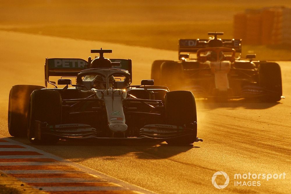 Lewis Hamilton, Mercedes F1 W11 EQ Power+, leads Carlos Sainz, McLaren MCL35 