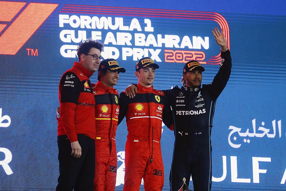 Mattia Binotto, Team Principal, Ferrari, Carlos Sainz Jr., Ferrari, 2nd position, Charles Leclerc, Ferrari, 1st position, Lewis Hamilton, Mercedes-AMG, 3rd position, on the podium