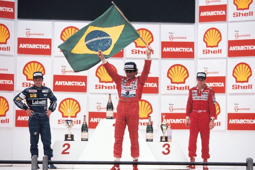 Podium: Race winner Ayrton Senna, McLaren, second place Riccardo Patrese, Williams, third place Gerhard Berger, McLaren