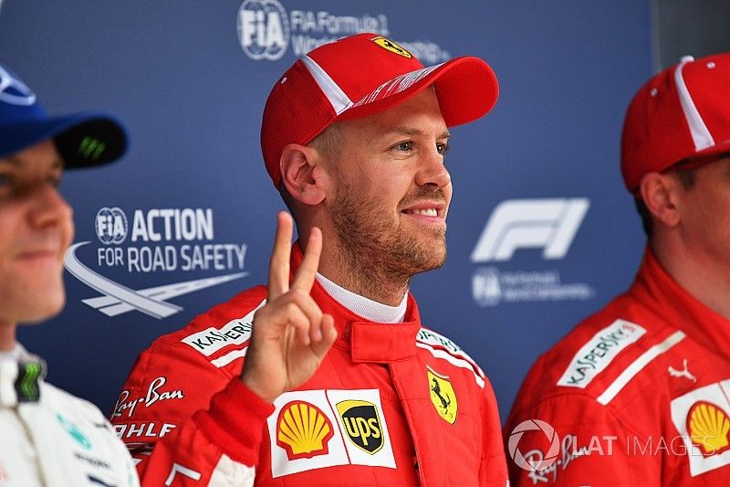 Ganador de la pole Sebastian Vettel, Ferrari