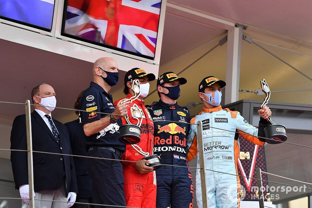 Adrian Newey, Chief Technical Officer, Red Bull Racing, Carlos Sainz Jr., Ferrari, 2nd position, Max Verstappen, Red Bull Racing, 1st position, and Lando Norris, McLaren, 3rd position, on the podium