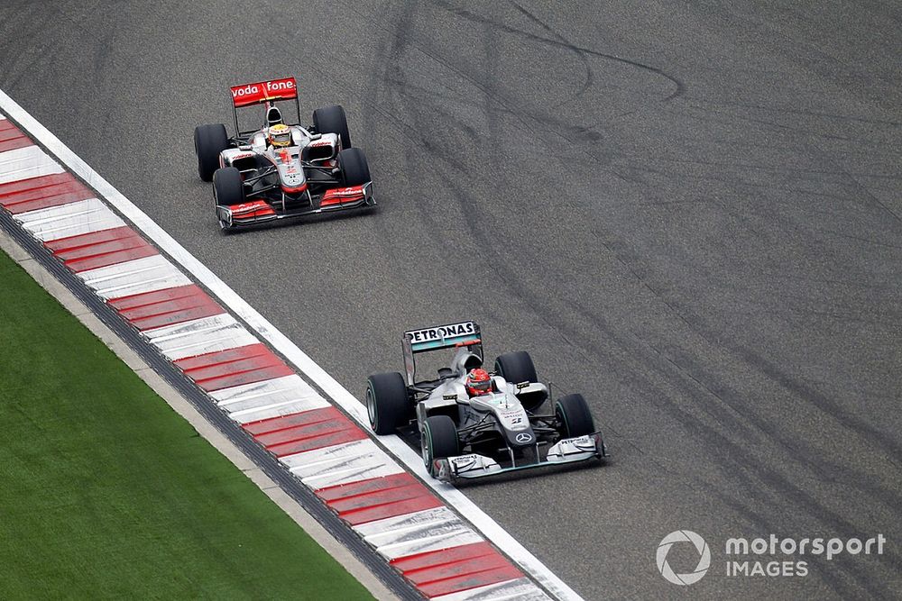 Michael Schumacher, Mercedes GP W01, leads Lewis Hamilton, McLaren MP4-25 Mercedes