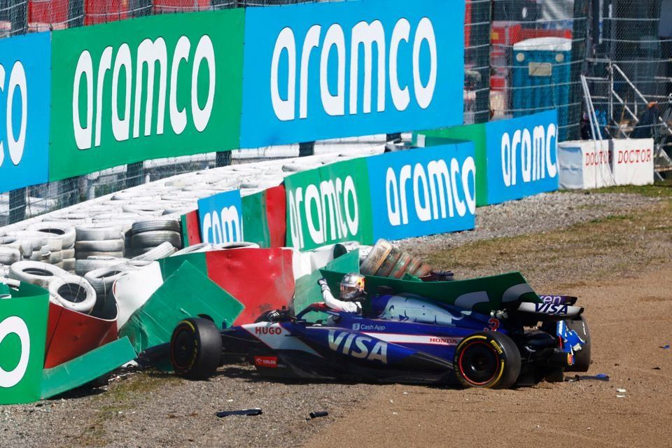 The cars of Daniel Ricciardo, RB F1 Team VCARB 01 and Alex Albon, Williams FW46 in the tyre barrier after they crashed on the opening lap