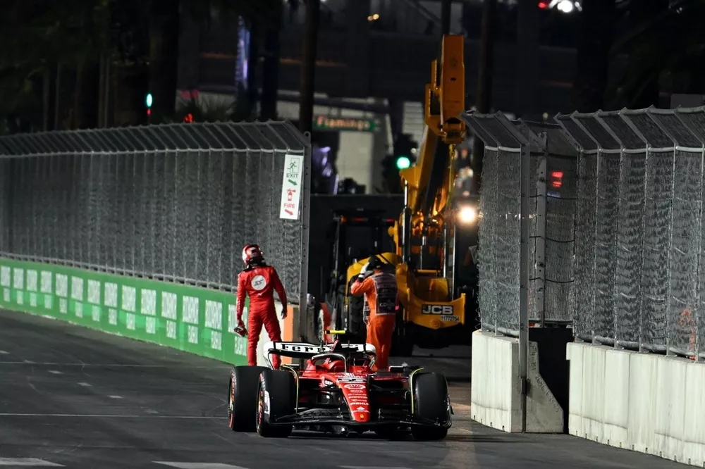 Carlos Sainz, Ferrari SF-23, stops his car on circuit after damage from a manhole cover