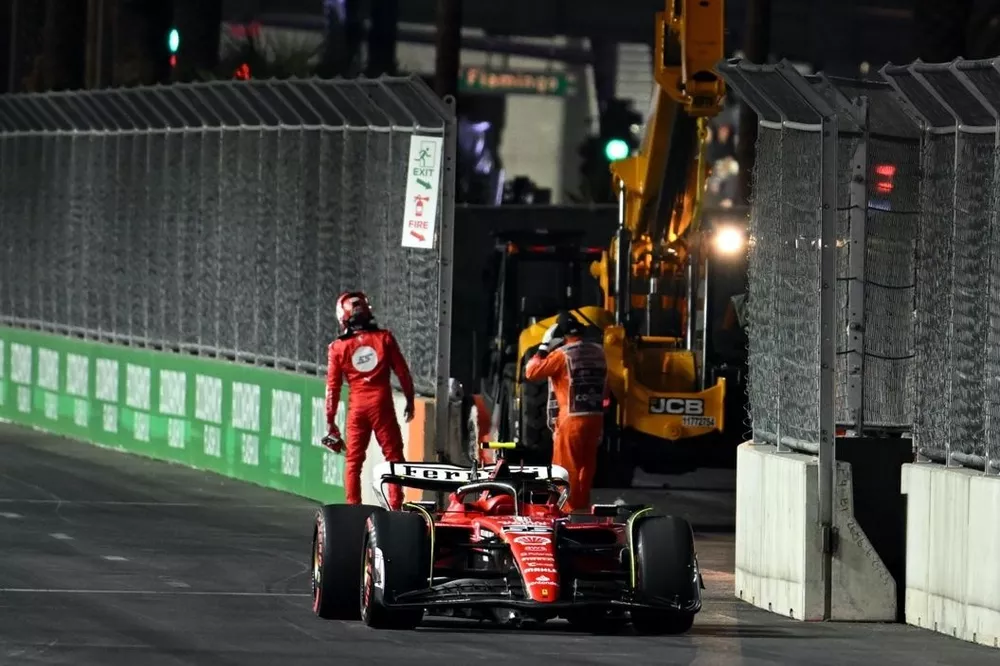 Carlos Sainz, Ferrari SF-23, stops his car on circuit after damage from a manhole cover