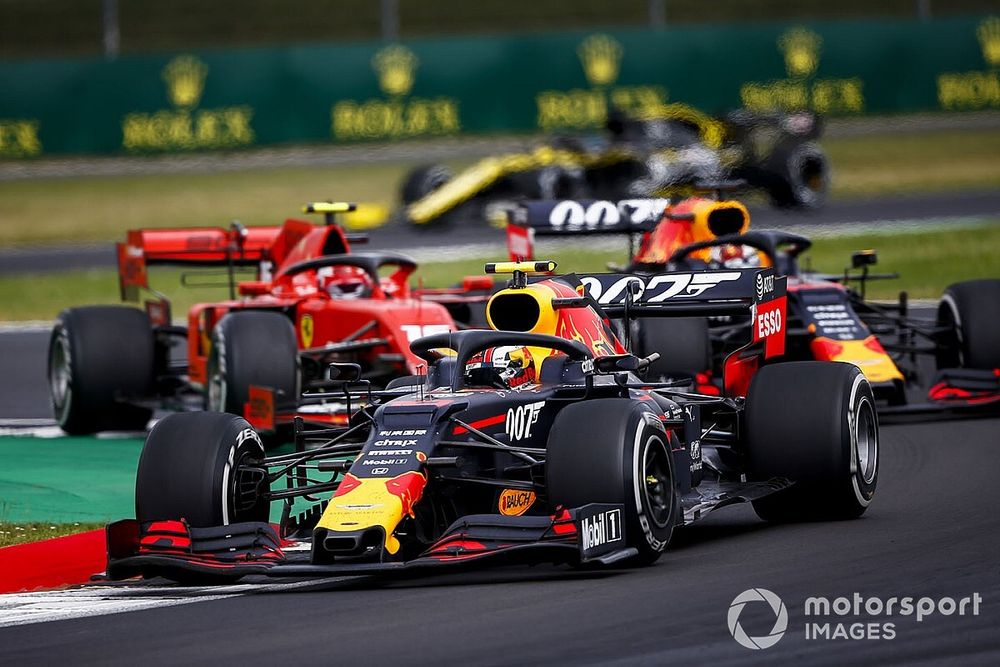 Pierre Gasly, Red Bull Racing RB15, leads Max Verstappen, Red Bull Racing RB15, and Charles Leclerc, Ferrari SF90