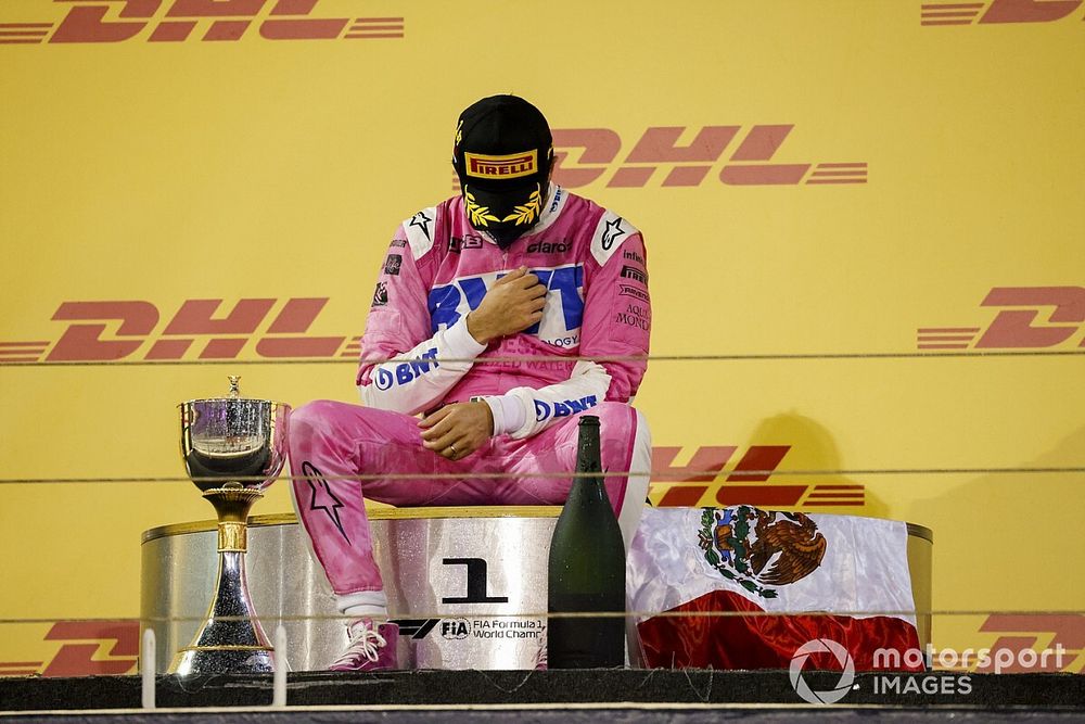 Sergio Perez, Racing Point, 1st position, sits on the podium