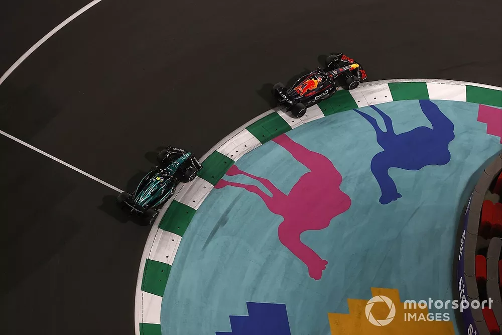 Max Verstappen, Red Bull Racing RB19, leads Fernando Alonso, Aston Martin AMR23